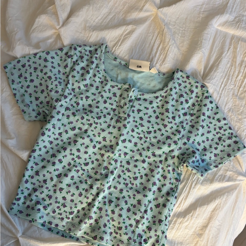Daisy Light Blue Top with Purple Floral Design